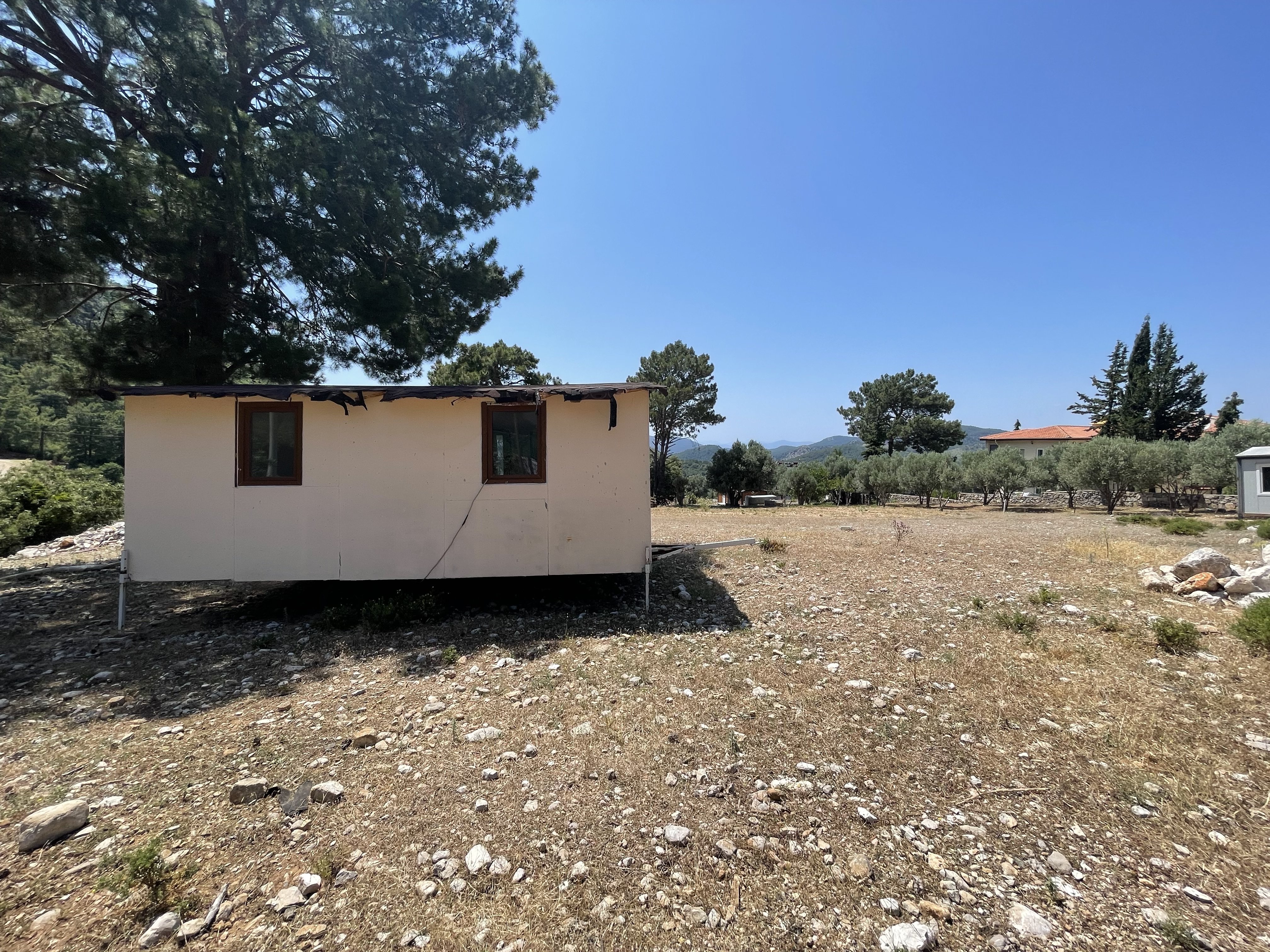 FETHİYE ÖLÜDENİZ'DE SATILIK 700 m² İMARLI KÖŞE PARSEL ARSA