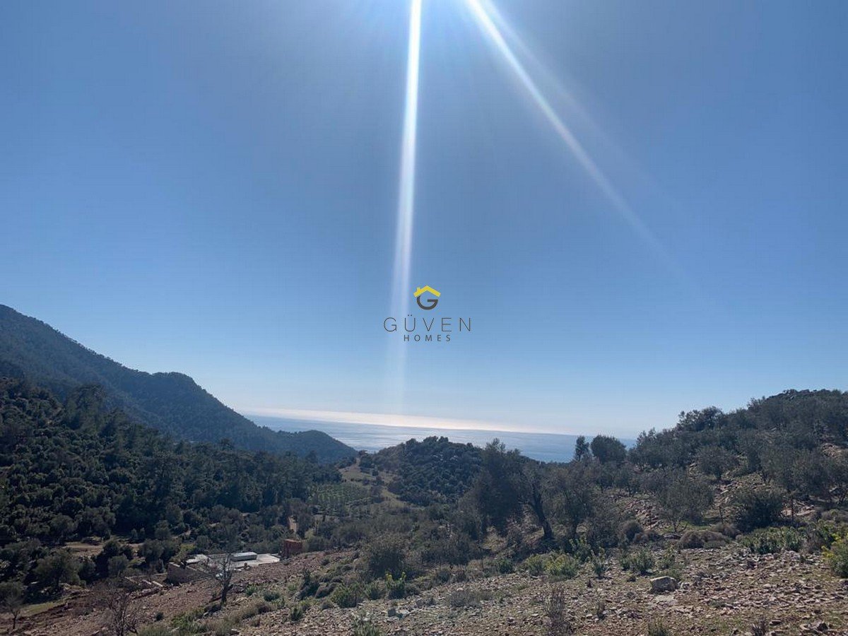 GÜVEN HOMES TAN FARALYA KİRMEDE DENİZ MANZARALI 1910m² TARLA